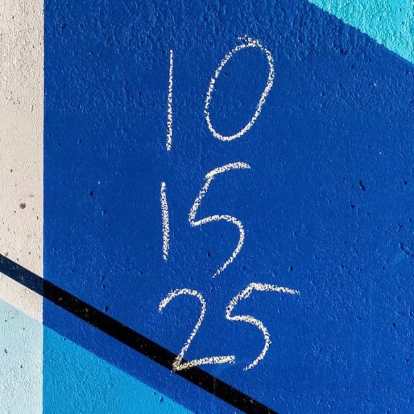 numbers on a blue wall