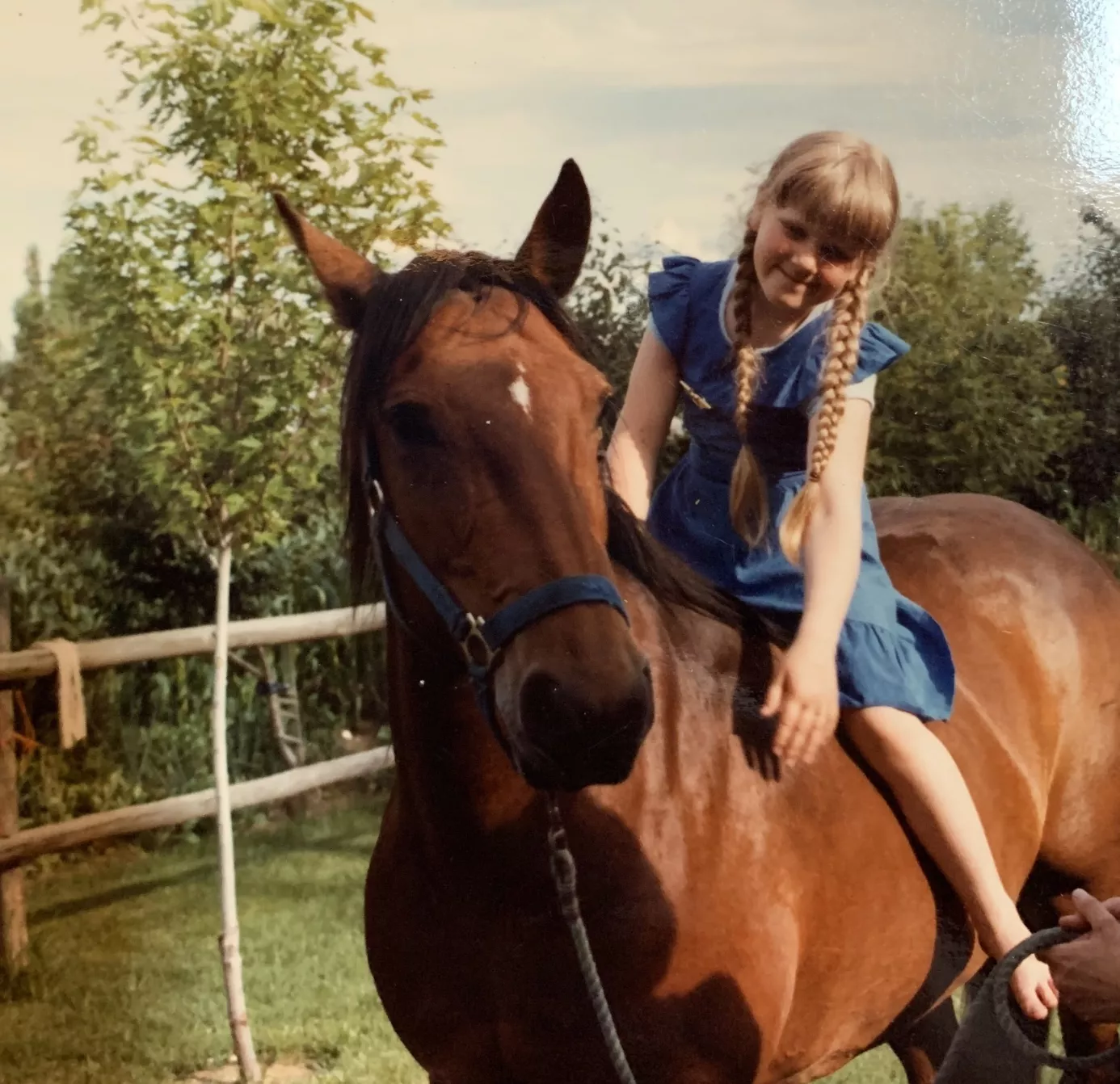 Mari as a child, buckin' broncos!